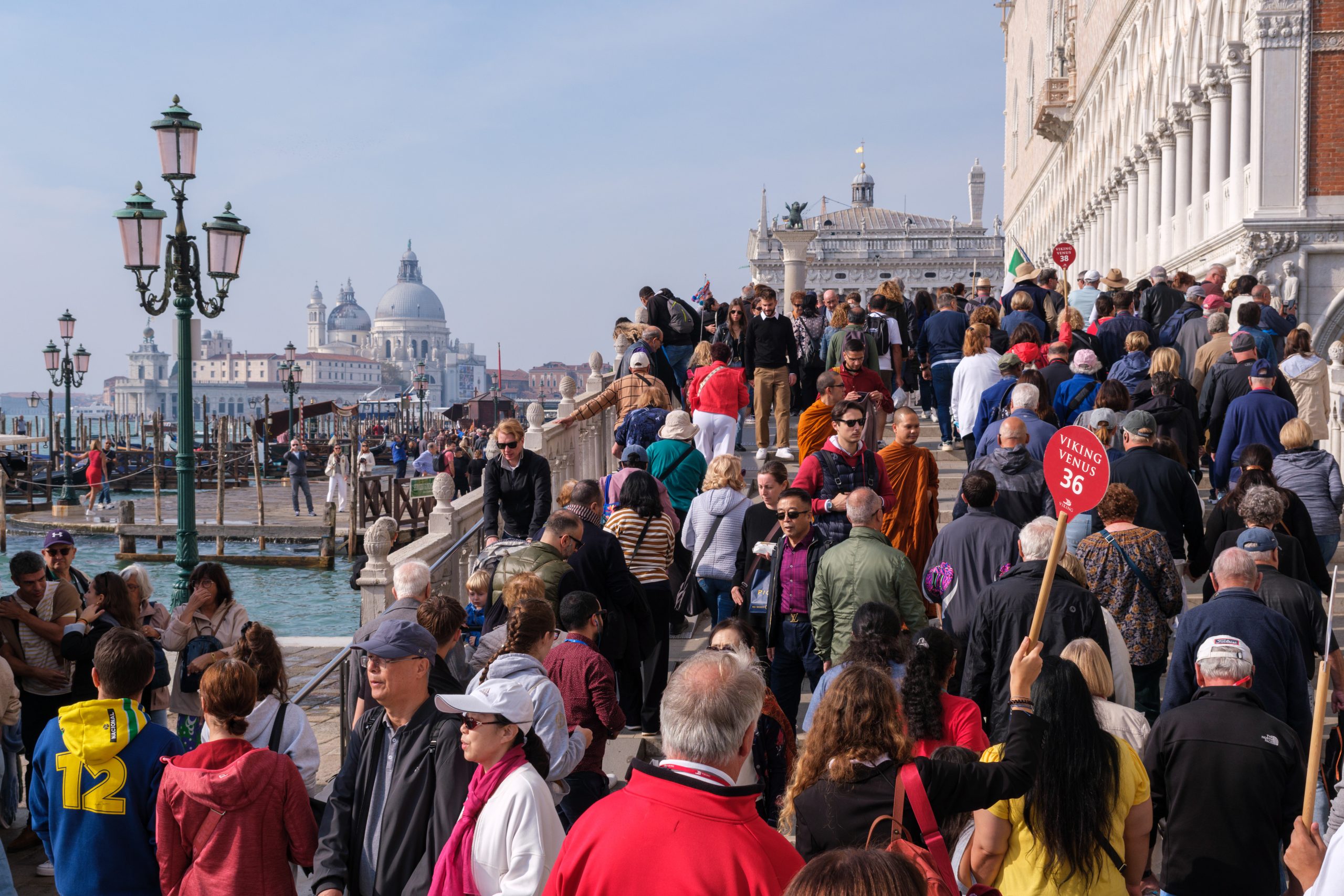 An overtourism example in Venice on a hot busy day